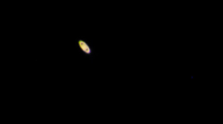 Saturn as photographed via eyepiece projection with Peter Jedicke's smartphone.