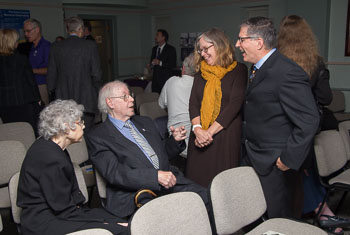 Honored guests chat prior to ceremony.