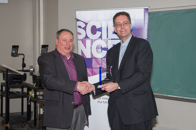 Dr. Pete Worden receives the 2016 Distinguished Lecture Award from former CPSX Director Dr. Peter Brown.
