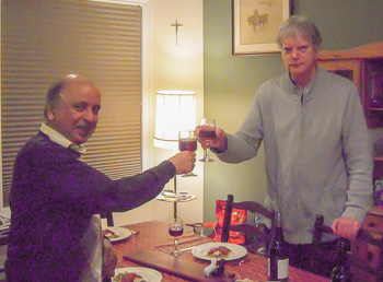 Toasting the discovery of gravitational waves. (l) Ram Valluri, and (r) Peter Komorowski