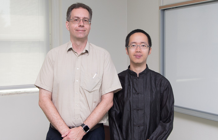 Quanzhi Ye (right) with supervisor Prof. Peter Brown.